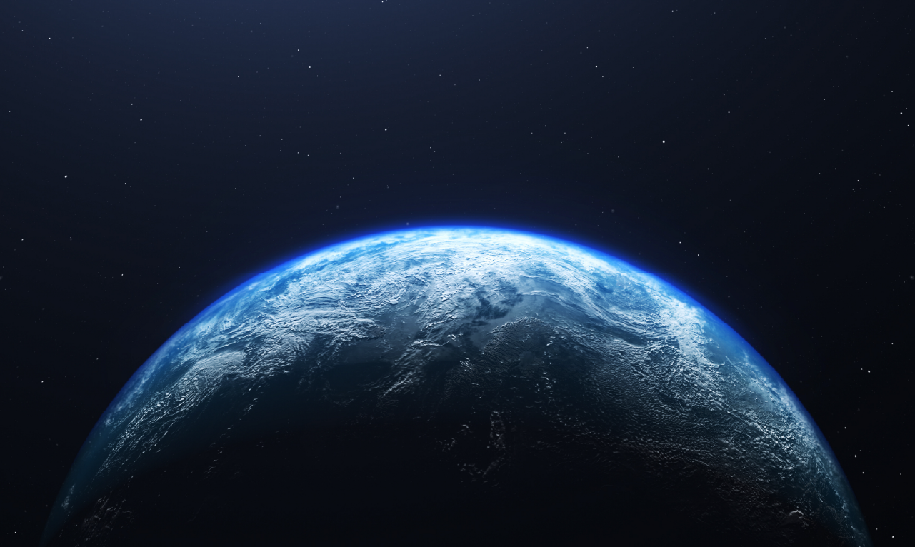 Vista parcial do planeta Terra a partir do espaço, com uma aura azul brilhante a destacar-se contra o fundo escuro do universo. A imagem transmite uma sensação de tecnologia, inovação e exploração global – ideal para ilustrar temas de transformação digital e visão estratégica.