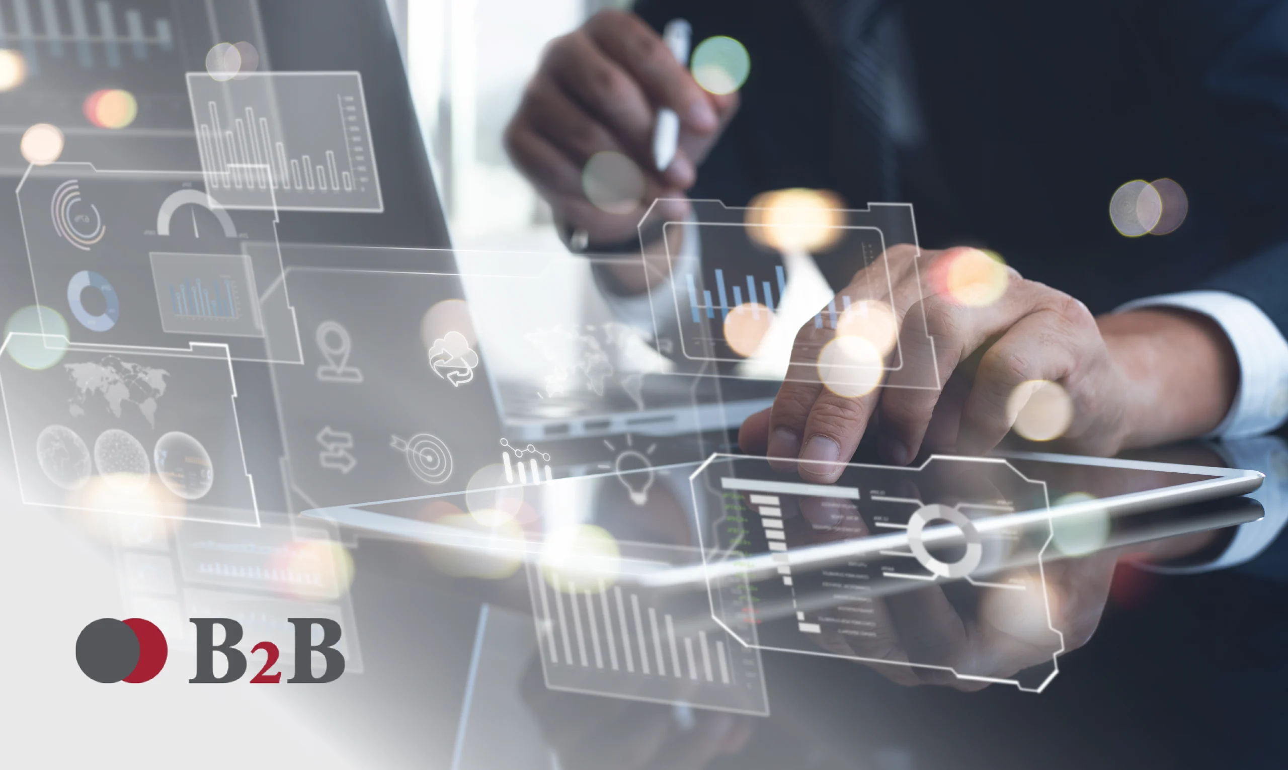 Professional interacting with a tablet surrounded by digital interfaces and charts, representing B2B process modernization through technology.
